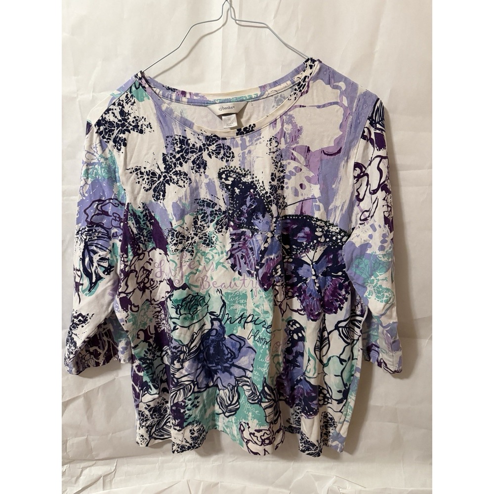 CJ Banks top features a whimsical butterfly and floral print Size 1x